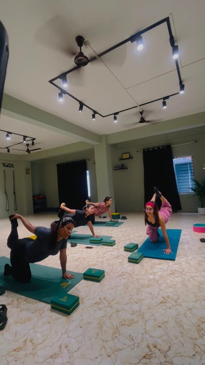 Morning group yoga class in the practice hall at Paathway2Yoga studio, Ulubari, Guwahati